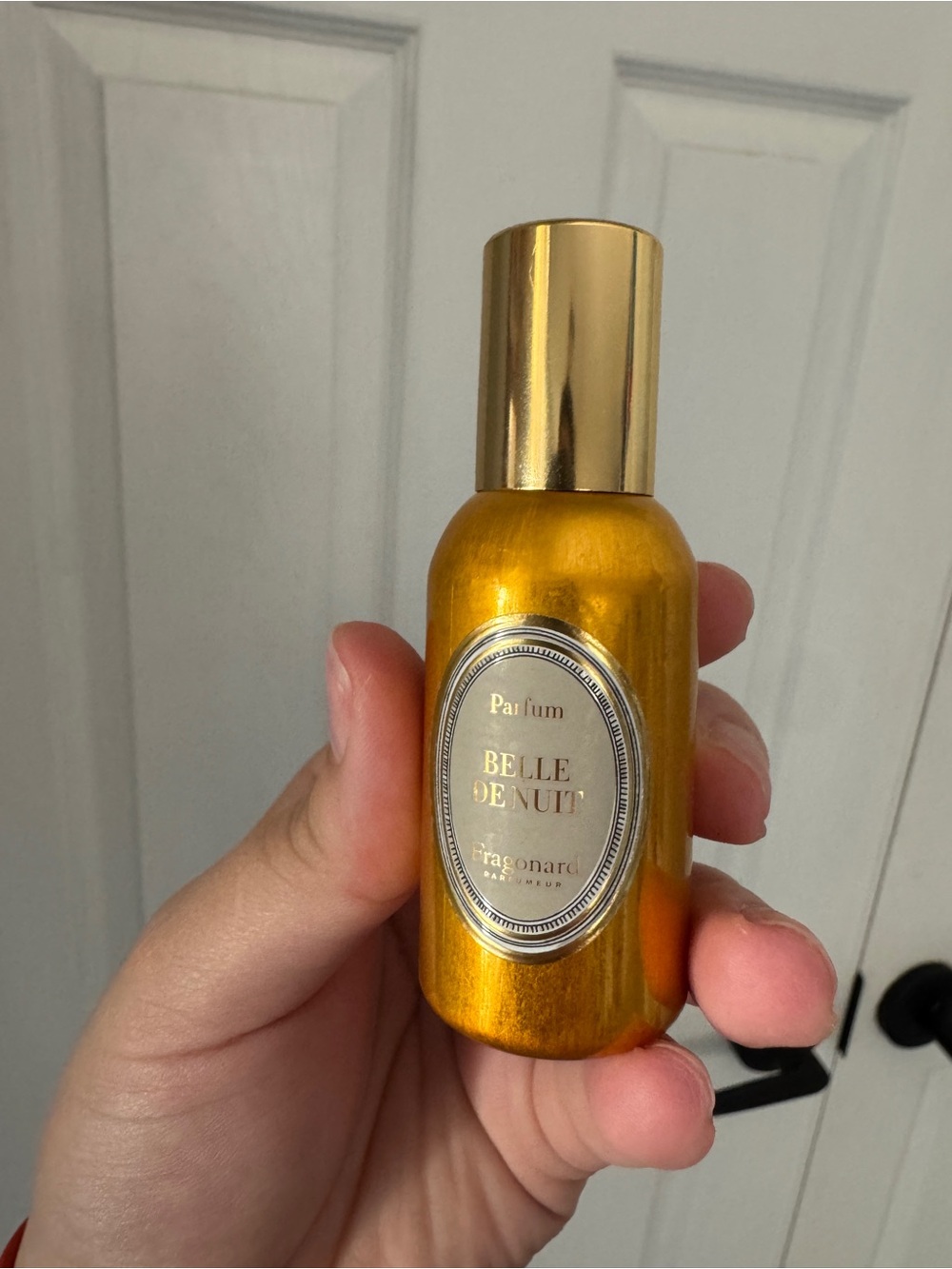 Belle De Nuit Parfum Spray in Metallic Gold Bottle